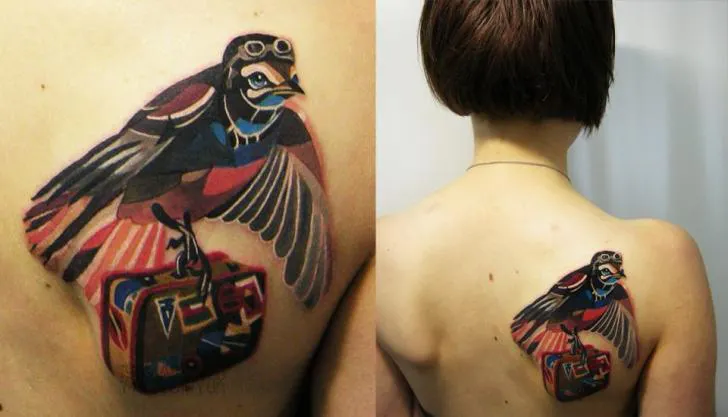 tattoo-back-bird-suitcase-abstract